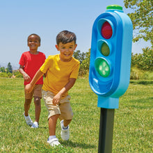 Blue and green traffic light play toy with red, yellow, and green lights