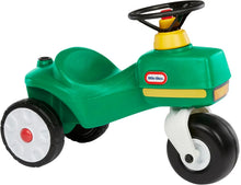 Green ride-on tractor with yellow seat and black steering wheel; front side view