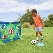 Soccer trainer playset with net and numbered mat, set up with child running in grass