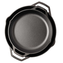 Gray cast iron skillet with dual handles and loop grip, top view