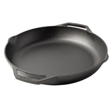 Black cast iron skillet with side handles and pouring spouts, angled view