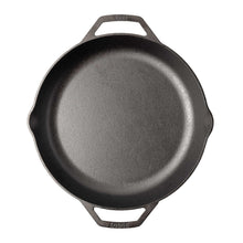 Small round cast iron skillet with side handles and embossed brand marks