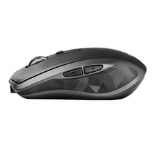 Logitech MX wireless mouse with dark gray textured sides and scroll buttons