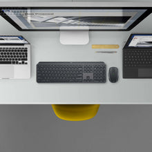 Wireless keyboard and mouse combo on desk, dark gray keyboard and mouse