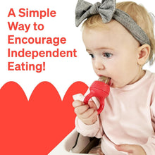 Baby holding a red fruit feeder with soft teether handle