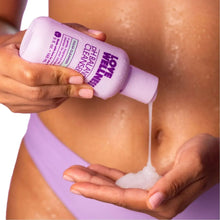 Love Wellness pH Balanced Cleanser dispensed onto wipes being used on skin