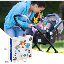 Baby play arch toy attached to a stroller, with hanging animal and ocean figures