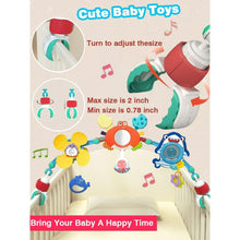 Baby play arch with adjustable span, hanging ocean-themed toys on curved bar