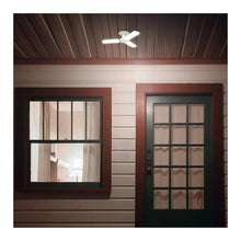 Three-panel LED ceiling light fixture on an outdoor porch ceiling