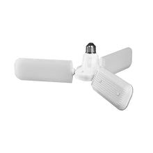 Three-panel multi-directional LED light with white housing and metal base