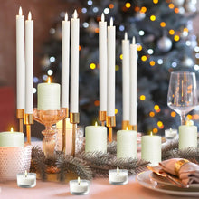 Flameless LED taper candles with ivory pillar candles and warm wax-like glow