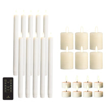 Flameless LED candle set with white taper candles, pillar candles, and black remote