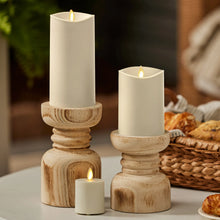 Set of 3 cream LED candles in carved wooden holders, flickering flame tops.