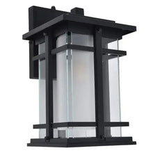 Black outdoor LED wall lantern with vertical bars and frosted glass panel inserts
