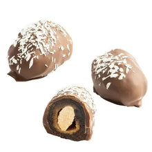 Chocolate-covered dates with white shredded topping, two whole and one cut open