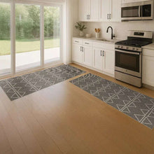 Dark jute runner rug with repeating triangle pattern, rectangular 2x6 size.