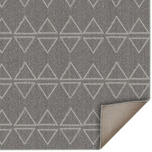 Grey runner rug close-up with woven triangle pattern and corner edge