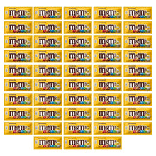 Yellow peanut M&M's chocolate candy packs arranged in a grid