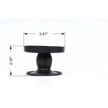 Black candle holder size: 2.35 in tall, 3.41 in wide