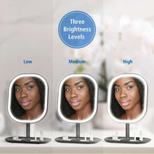 LED makeup mirror with round light frame and dark base, three brightness levels