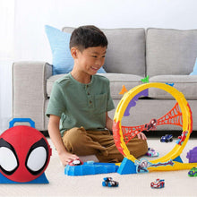 Spider-themed track playset with blue base, red ring, and small vehicle toys