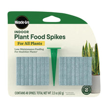 Miracle-Gro indoor plant food spikes package with two rows of turquoise spikes