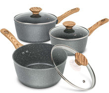 Gray speckled nonstick saucepans set with glass lids and wood-grain handles