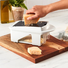 Vegetable chopper and slicer with hand pusher and clear collection bin