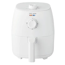 Arctic white air fryer with front dial and pull-out basket handle