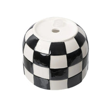 Round ceramic planter top with drain hole, glossy black-and-white checker pattern