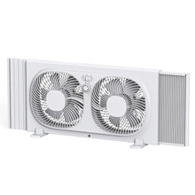White dual window fan with two circular fan grills and accordion side louvers