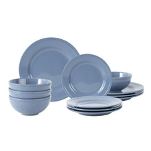 Blue stoneware dinnerware set with stacked plates and bowls