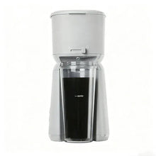 Single serve iced coffee maker in soft silver with clear pitcher and water window