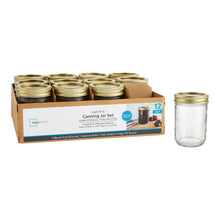 Box of 12-pack half-pint mason canning jars with brass lids; one jar shown