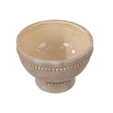 Cream ceramic pedestal plant pot bowl with dotted rim and glossy interior