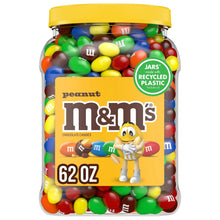 Peanut M&M's chocolate candy jar with yellow lid, filled with colorful candy pieces