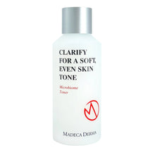 Microbiome toner bottle with silver cap and white label