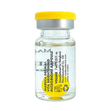 Microbiome ampoule bottle with yellow cap and clear glass body