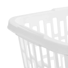 White laundry basket rim with handle cutouts, close-up