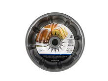 Gray fluted round nonstick cake pan with center hole and fluted ridges.