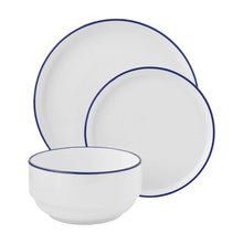 Stoneware bowl and plates with blue rims, white ceramic