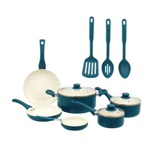Ceramic nonstick cookware set with blue pots, cream lids, and matching utensils