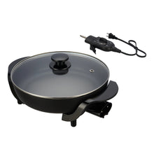 Black electric skillet with stainless lid and removable temperature control unit