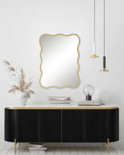 Large wavy-edge wall mirror with gold frame, rectangular shape