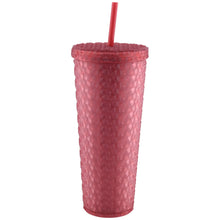 Pink plastic tumbler with lid and straw, textured pattern