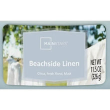 Beachside Linen label on blue glass jar candle with Mainstays branding, 11.5 oz