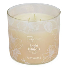 Glass jar scented candle with Bright Hibiscus label, three wicks visible