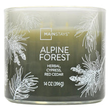 Scented candle jar with white wax, pine leaf wrap, Alpine Forest label, 14 oz