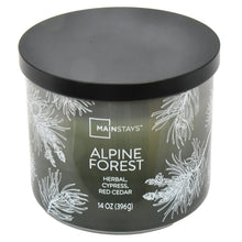 Scented candle with black lid and Alpine Forest herbal cypress red cedar label