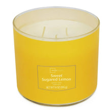 3-wick textured wrap candle in yellow glass jar with unlit wicks